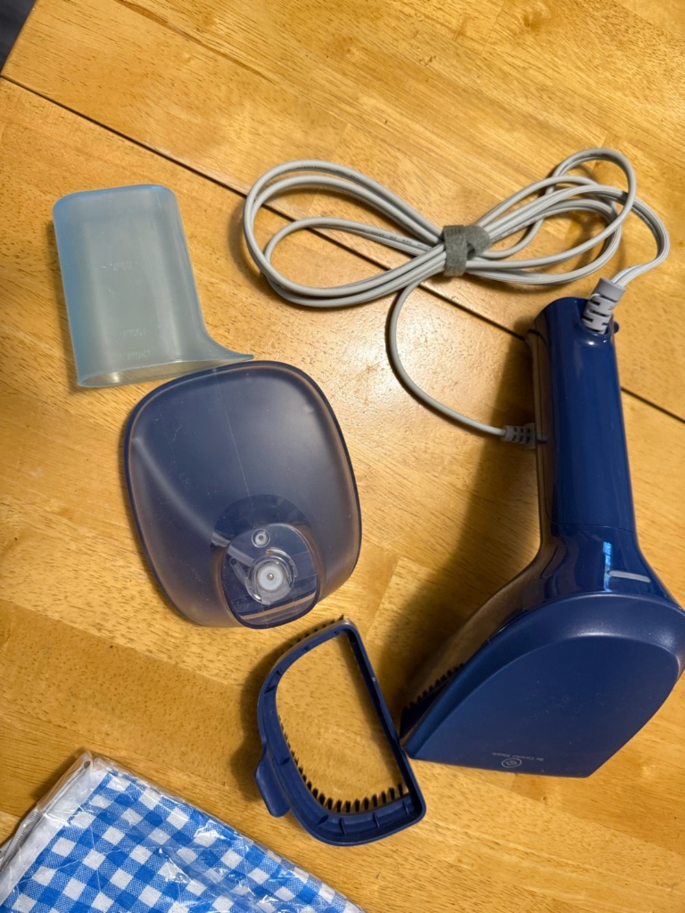 Amazon Handheld Fabric Steamer in Dark Blue and Light Blue.